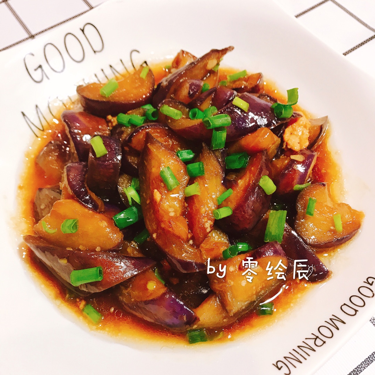 Transfer the braised eggplant to a serving dish