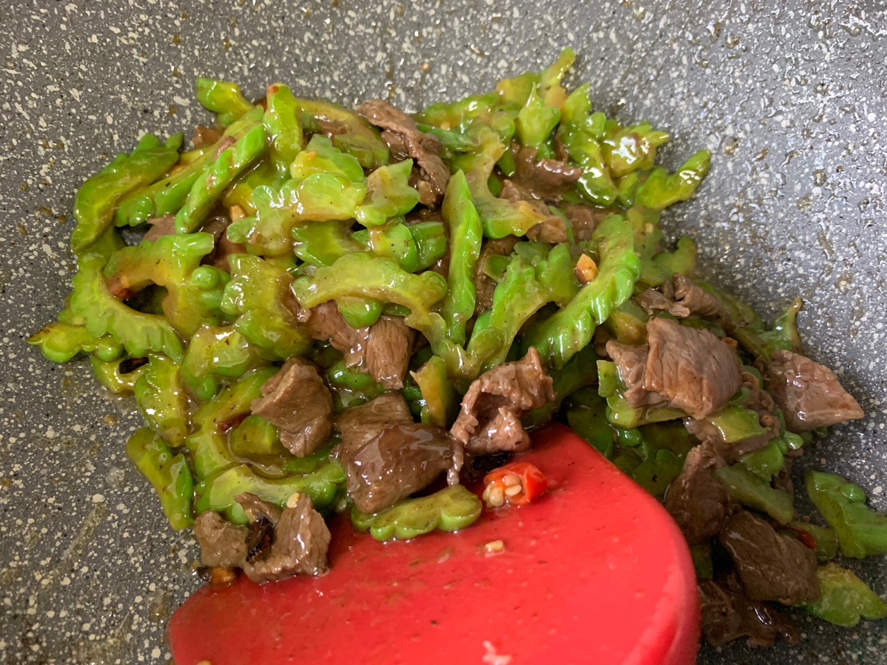 beef with bitter melon in wok