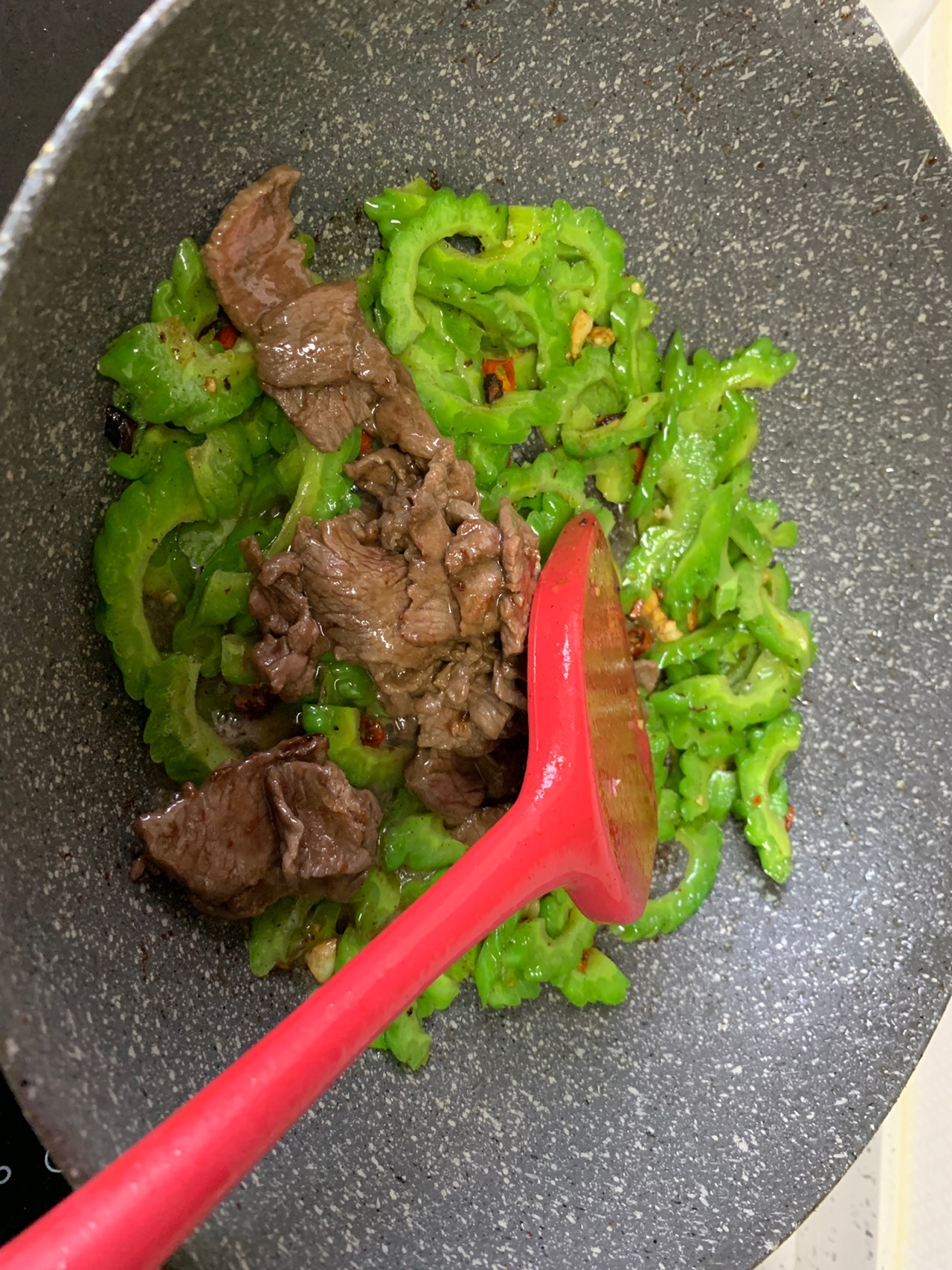 beef with bitter melon in wok
